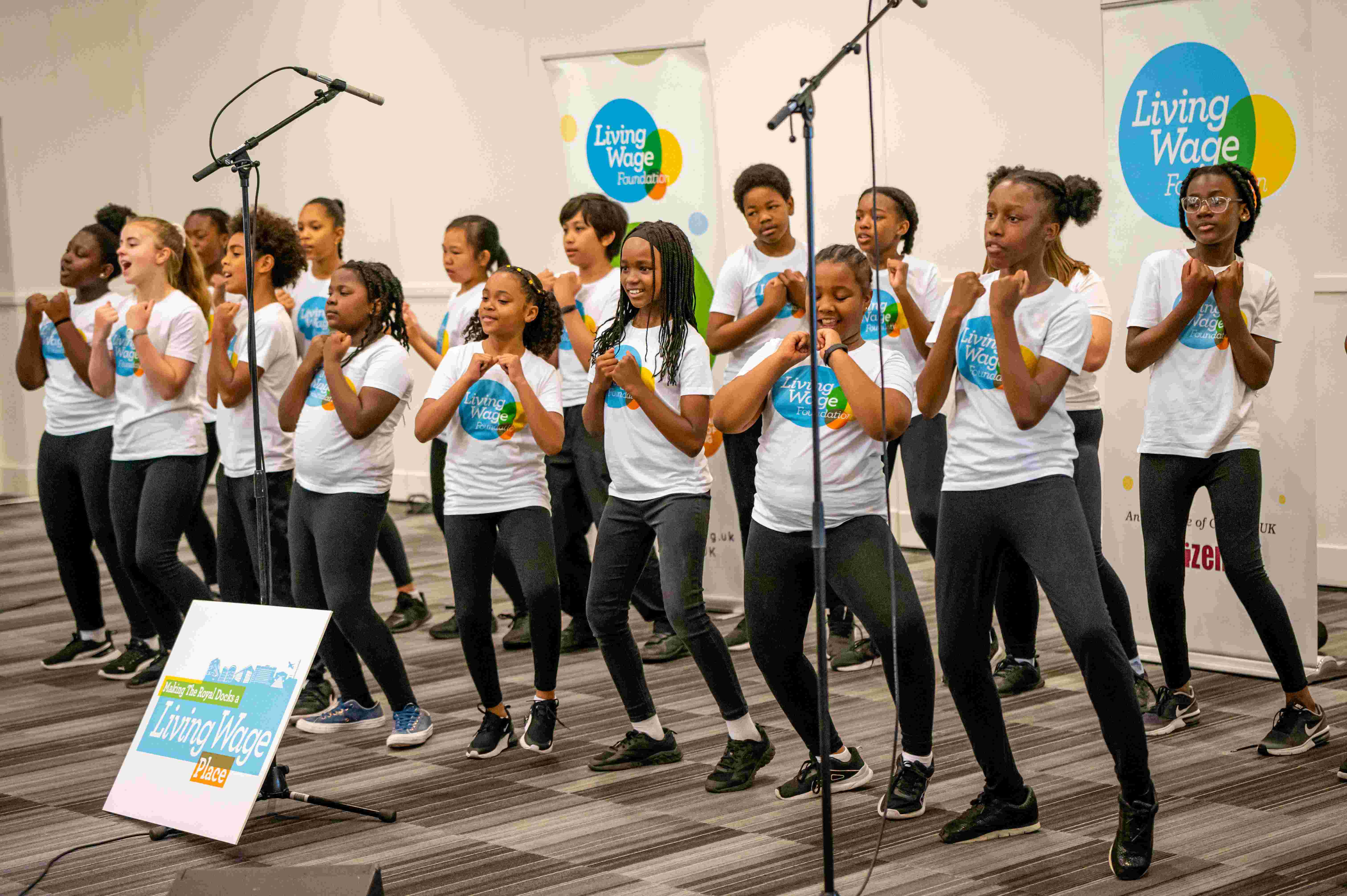 Children dancing at London living wage event 